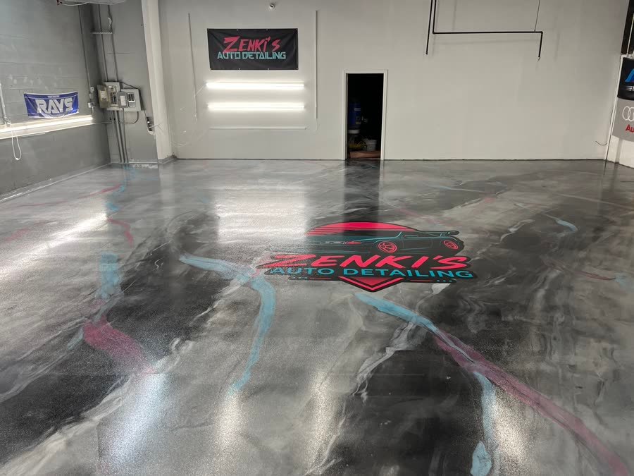 Metallic epoxy pour with a custom logo inlay